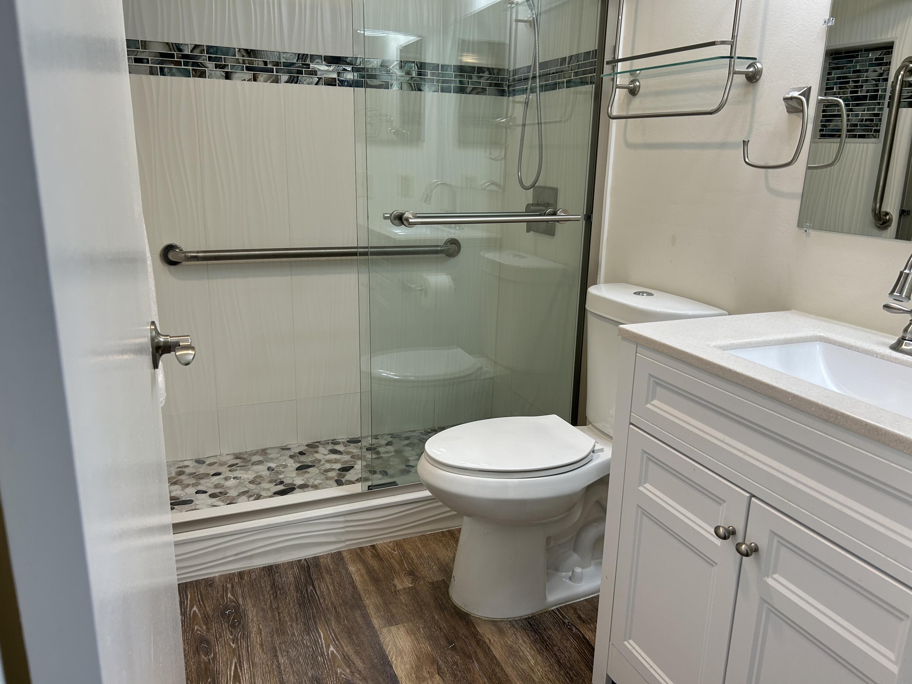 3046 Exeter C Boca Raton, FL 33434 - Photo 9 of 18 Bathroom w/stall shower