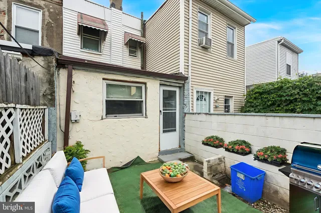 a view of backyard of house