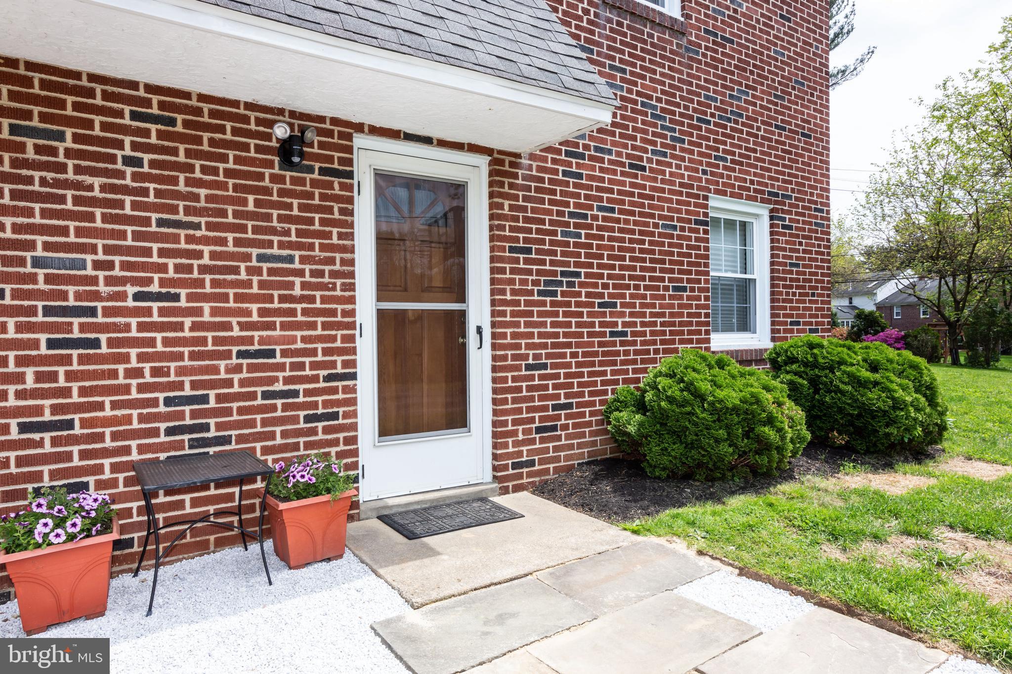 202 Woodcrest Road Media, PA 19063 - Photo 4 of 44 Side door entrance with patio