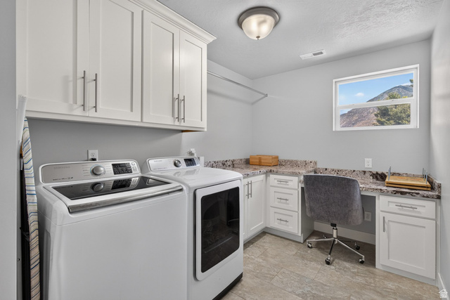 1263 East 1200th South Springville, UT 84663 - Photo 23 of 60 Utility room featuring white cabinetry, stone-finish countertops, and tile flooring