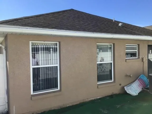 a front view of a house with windows