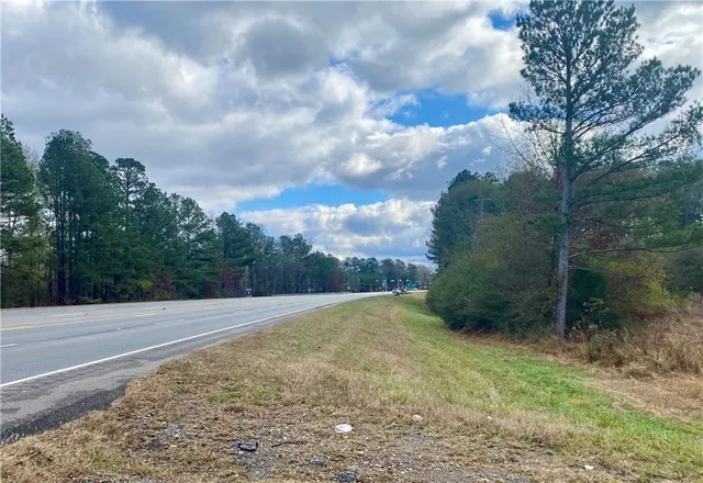 a view of a yard with an trees