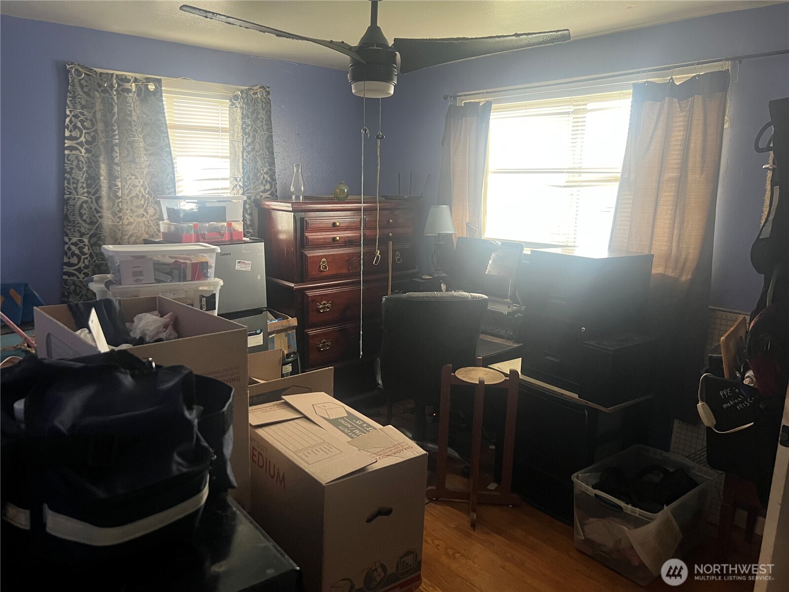 321 West Loop Drive Moses Lake, WA 98837 - Photo 18 of 23 a bathroom with sink mirror bathtub and window