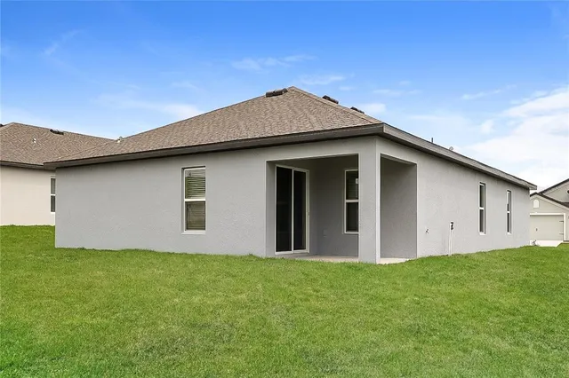 a house with garden in front of it