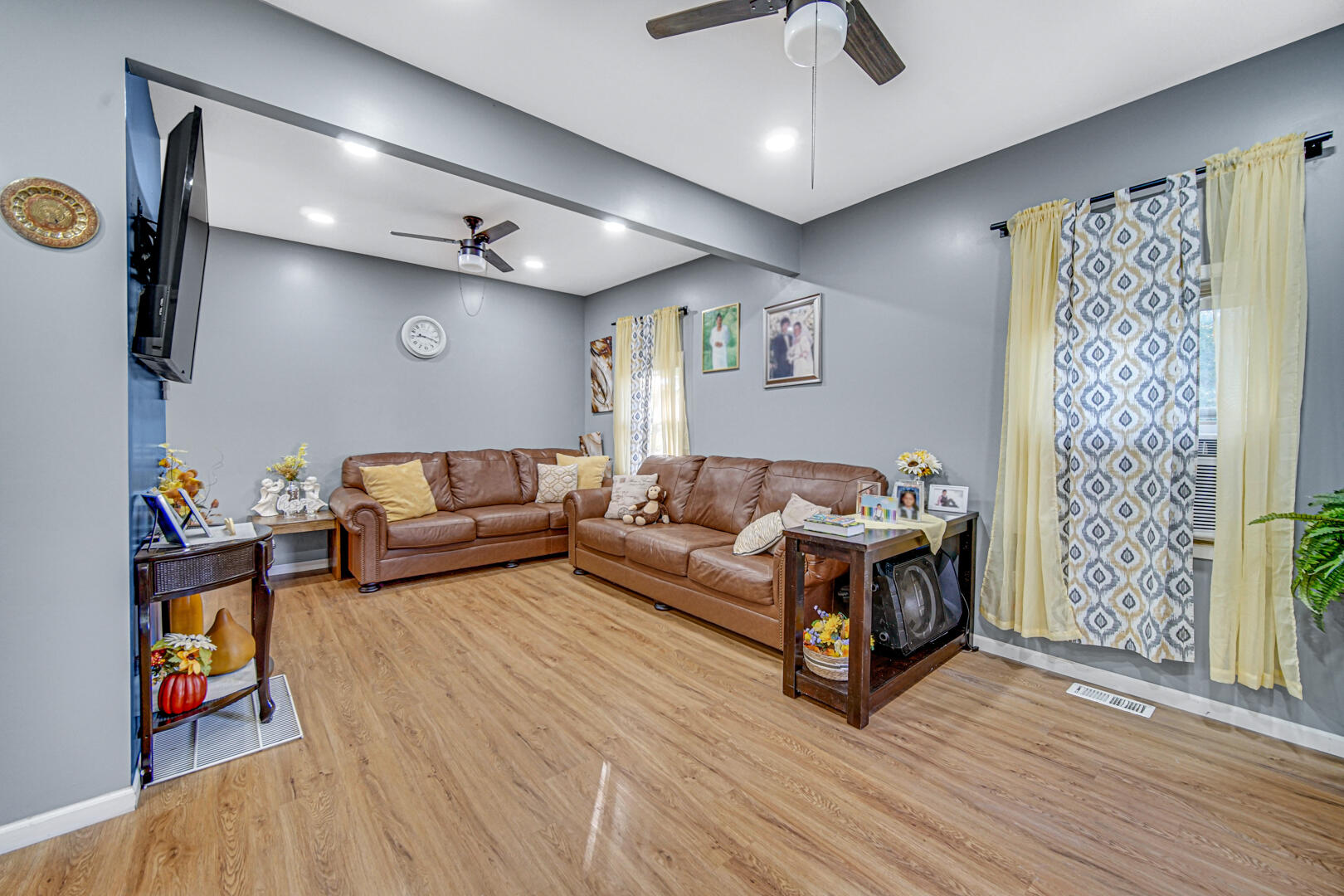 1047 Ralston Street Gary, IN 46406 - Photo 4 of 16 a living room with furniture and a wooden floor