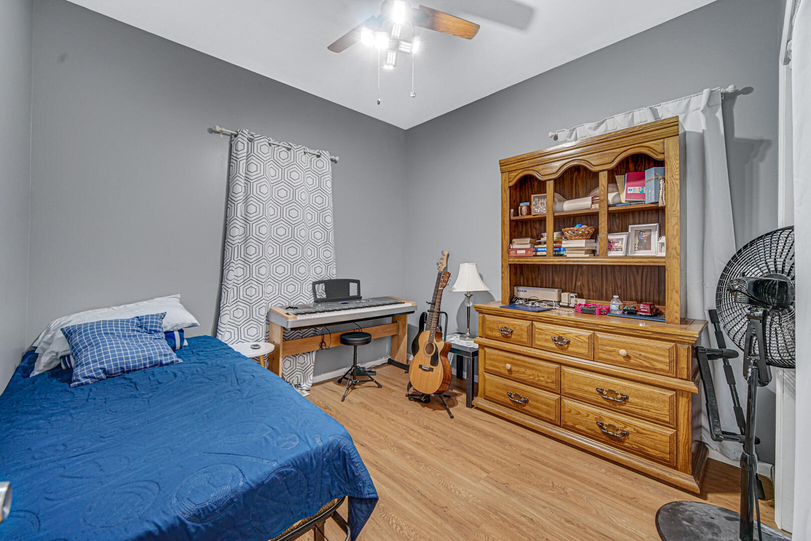1047 Ralston Street Gary, IN 46406 - Photo 10 of 16 a bedroom with furniture and a bed