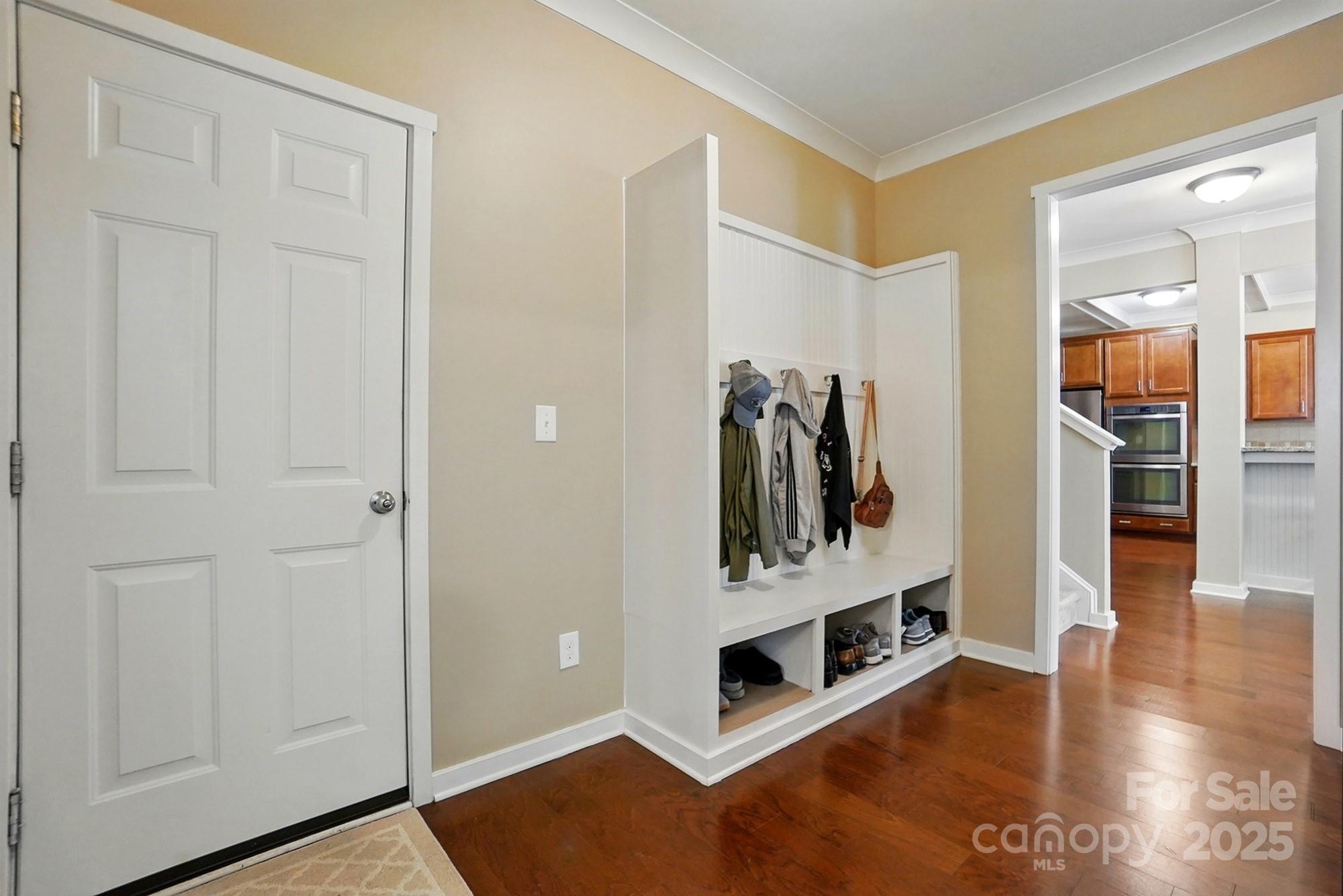 3106 Crosswind Drive Fort Mill, SC 29707 - Photo 22 of 43 a living room with furniture and a walk in closet with wooden floor