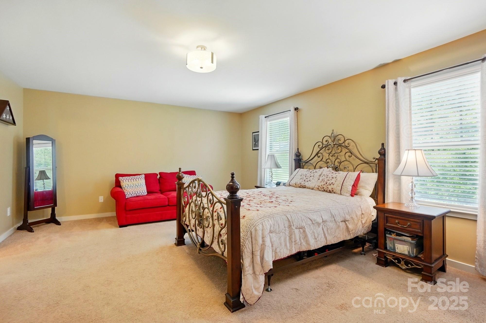 3106 Crosswind Drive Fort Mill, SC 29707 - Photo 27 of 43 a bedroom with a bed chair and a window