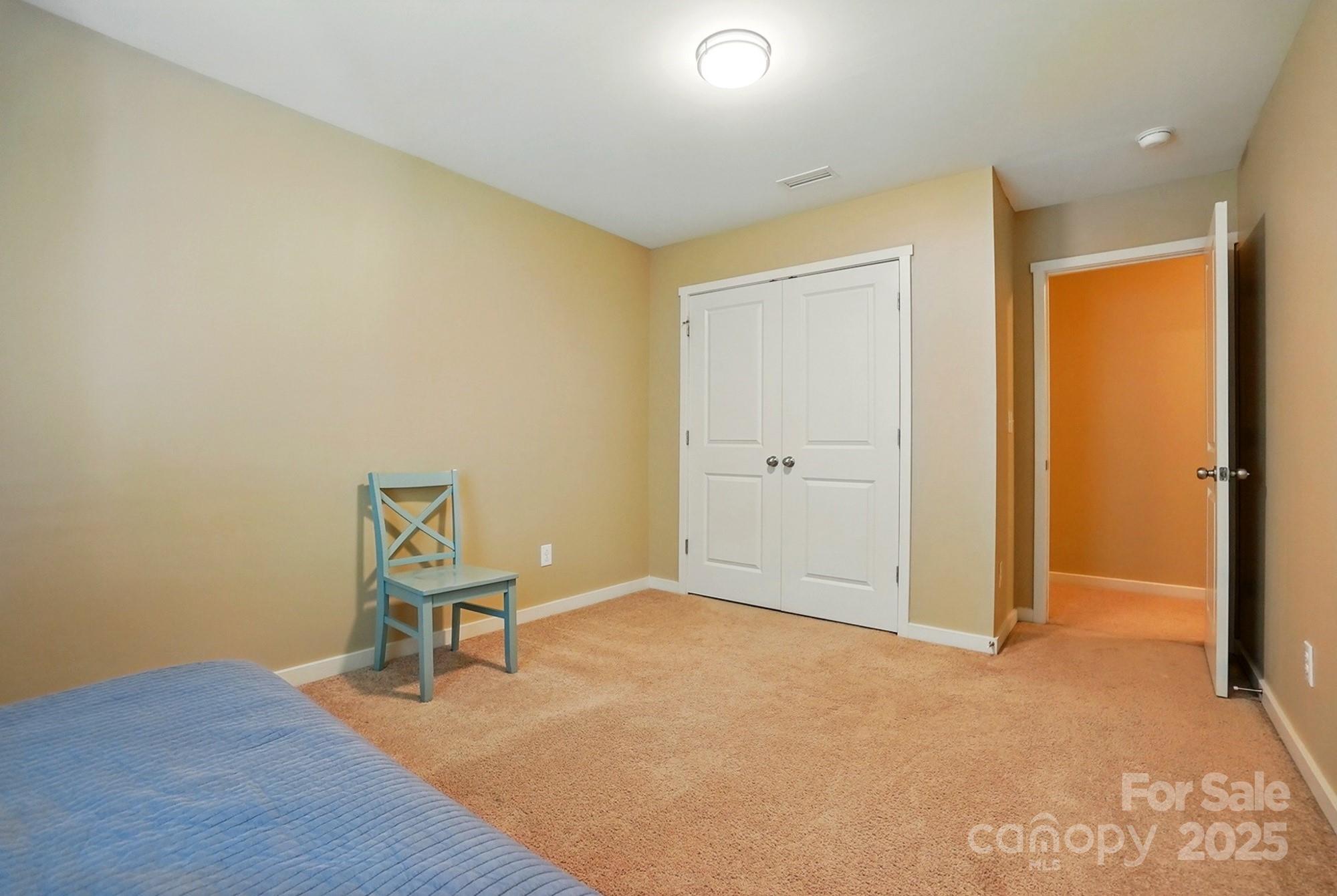 3106 Crosswind Drive Fort Mill, SC 29707 - Photo 36 of 43 an empty room and chair