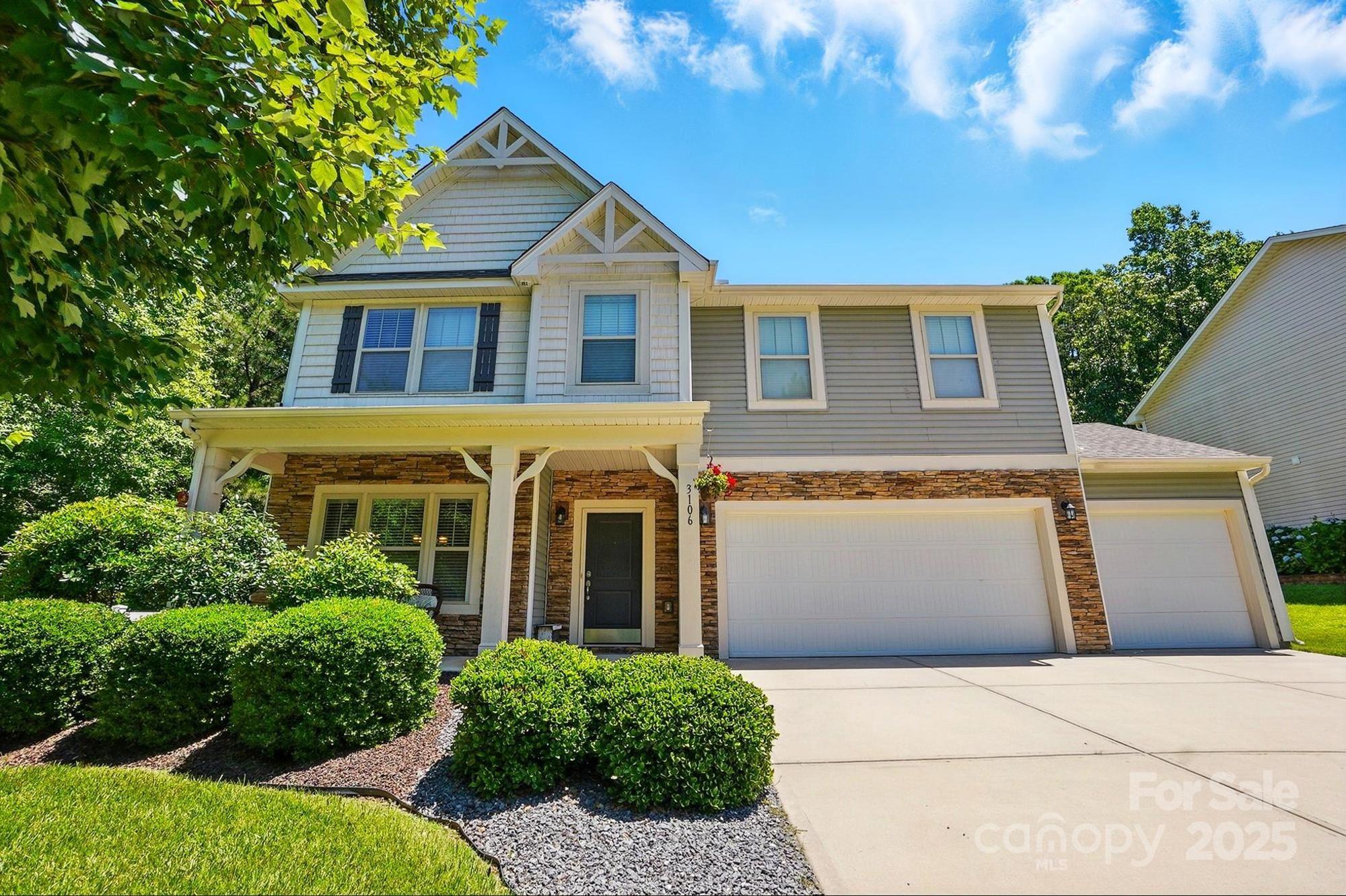 3106 Crosswind Drive Fort Mill, SC 29707 - Photo 43 of 43 a front view of a house with a yard