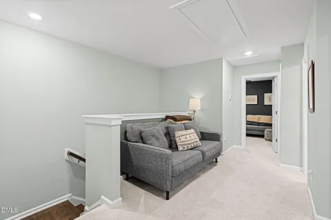 a living room with furniture and closet
