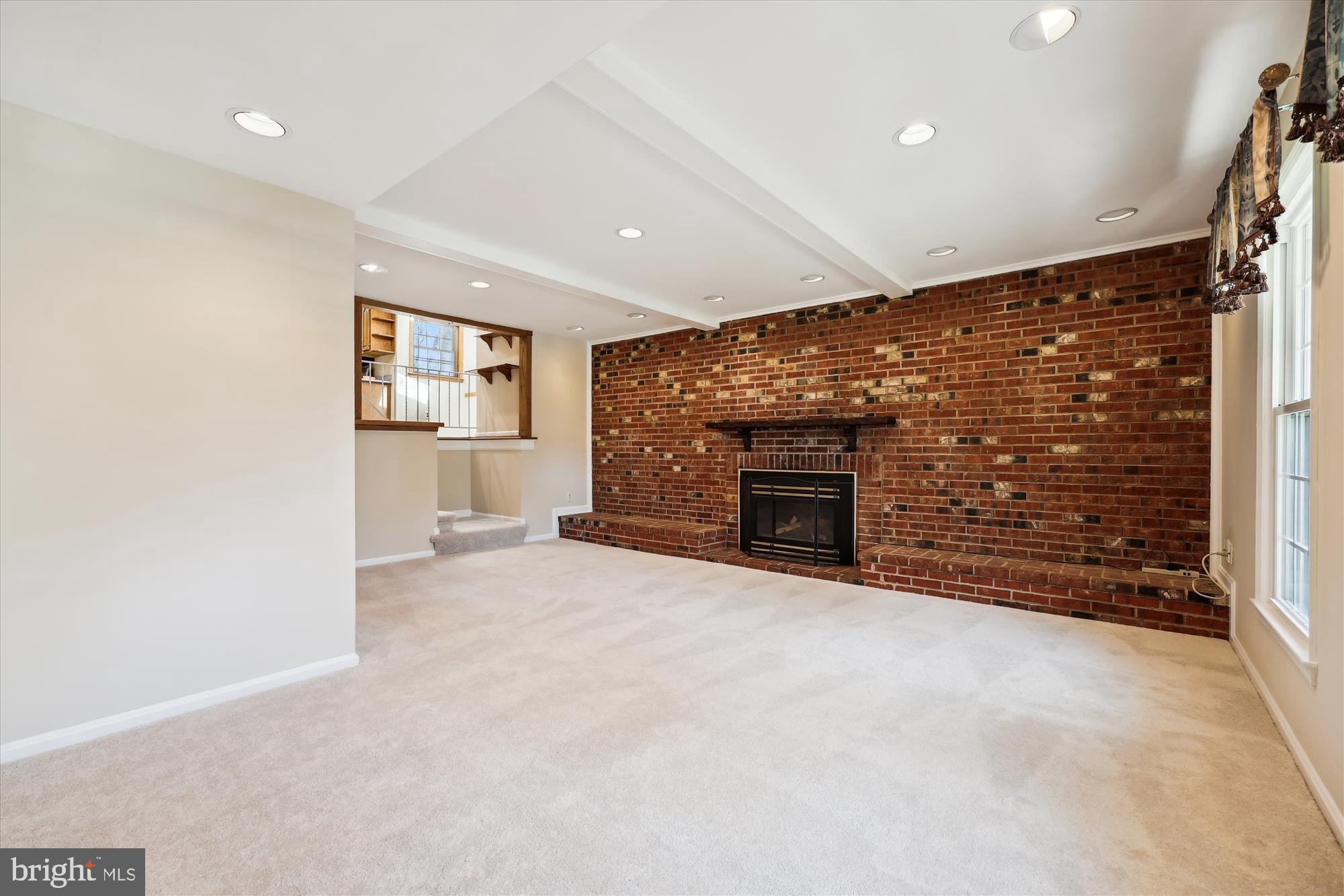 315 Summit Hall Road Gaithersburg, MD 20877 - Photo 11 of 76 an empty room with windows and fireplace