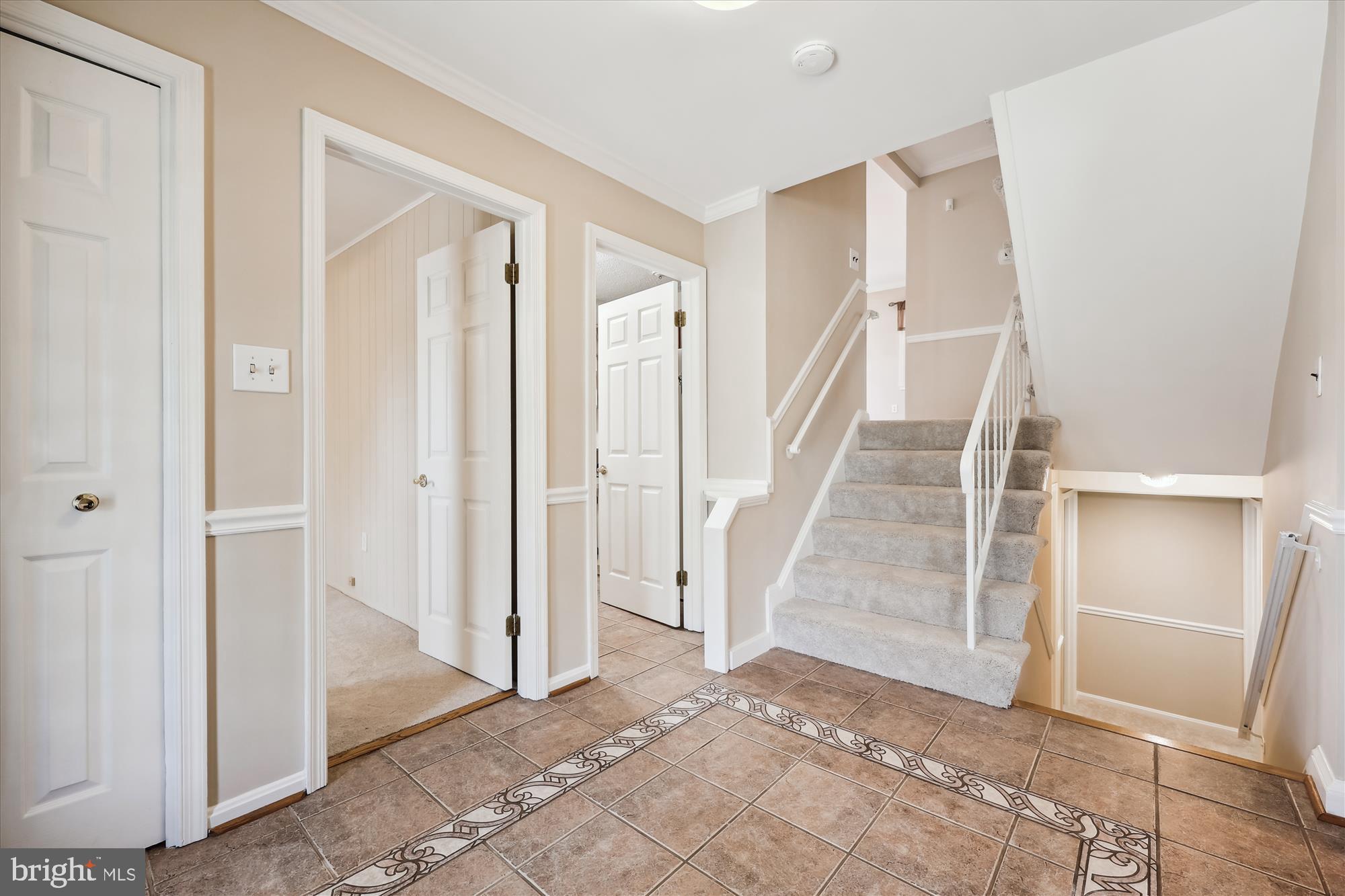 315 Summit Hall Road Gaithersburg, MD 20877 - Photo 20 of 76 a view of entryway with wooden floor and stairs
