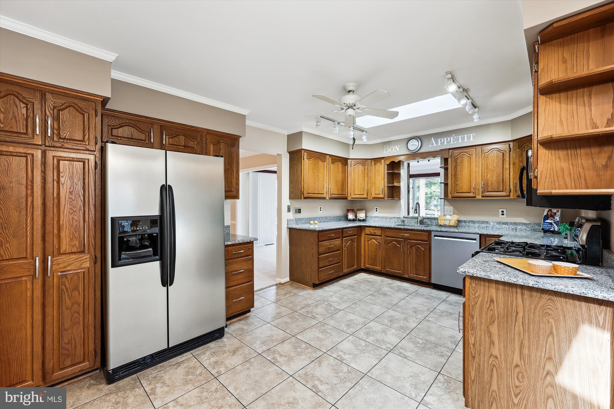315 Summit Hall Road Gaithersburg, MD 20877 - Photo 29 of 76 a kitchen with stainless steel appliances granite countertop a refrigerator a sink dishwasher stove and oven
