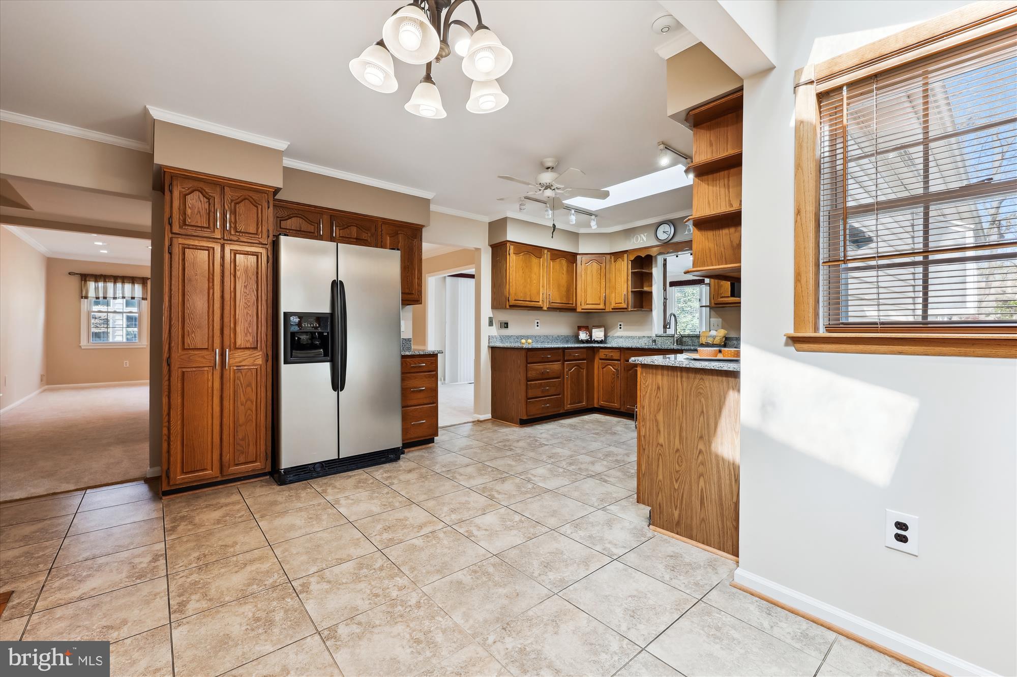 315 Summit Hall Road Gaithersburg, MD 20877 - Photo 33 of 76 a kitchen with stainless steel appliances granite countertop a refrigerator and a sink