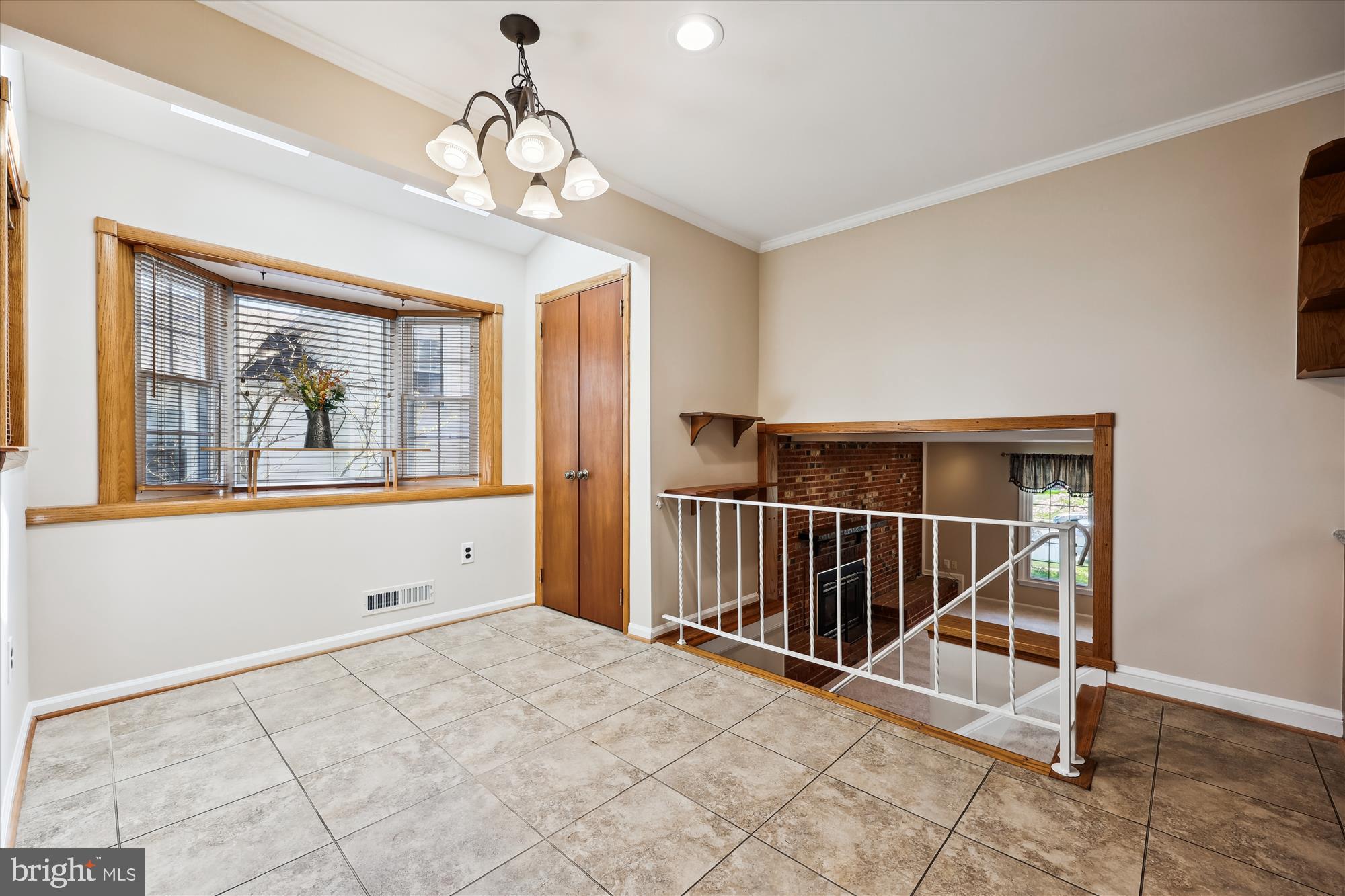 315 Summit Hall Road Gaithersburg, MD 20877 - Photo 34 of 76 a view of a room with wooden floor and windows