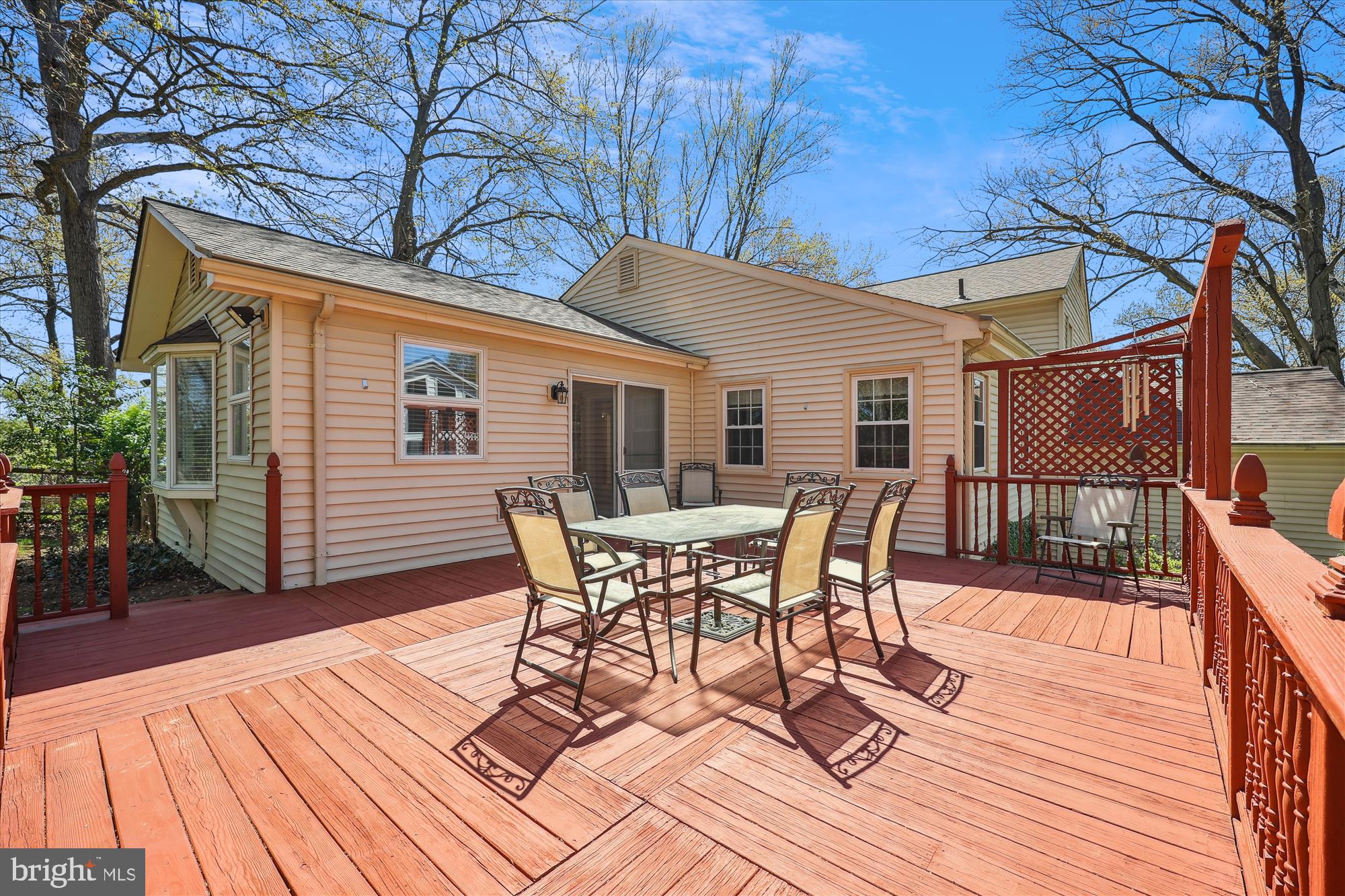 315 Summit Hall Road Gaithersburg, MD 20877 - Photo 38 of 76 a patio with wooden floor and outdoor seating