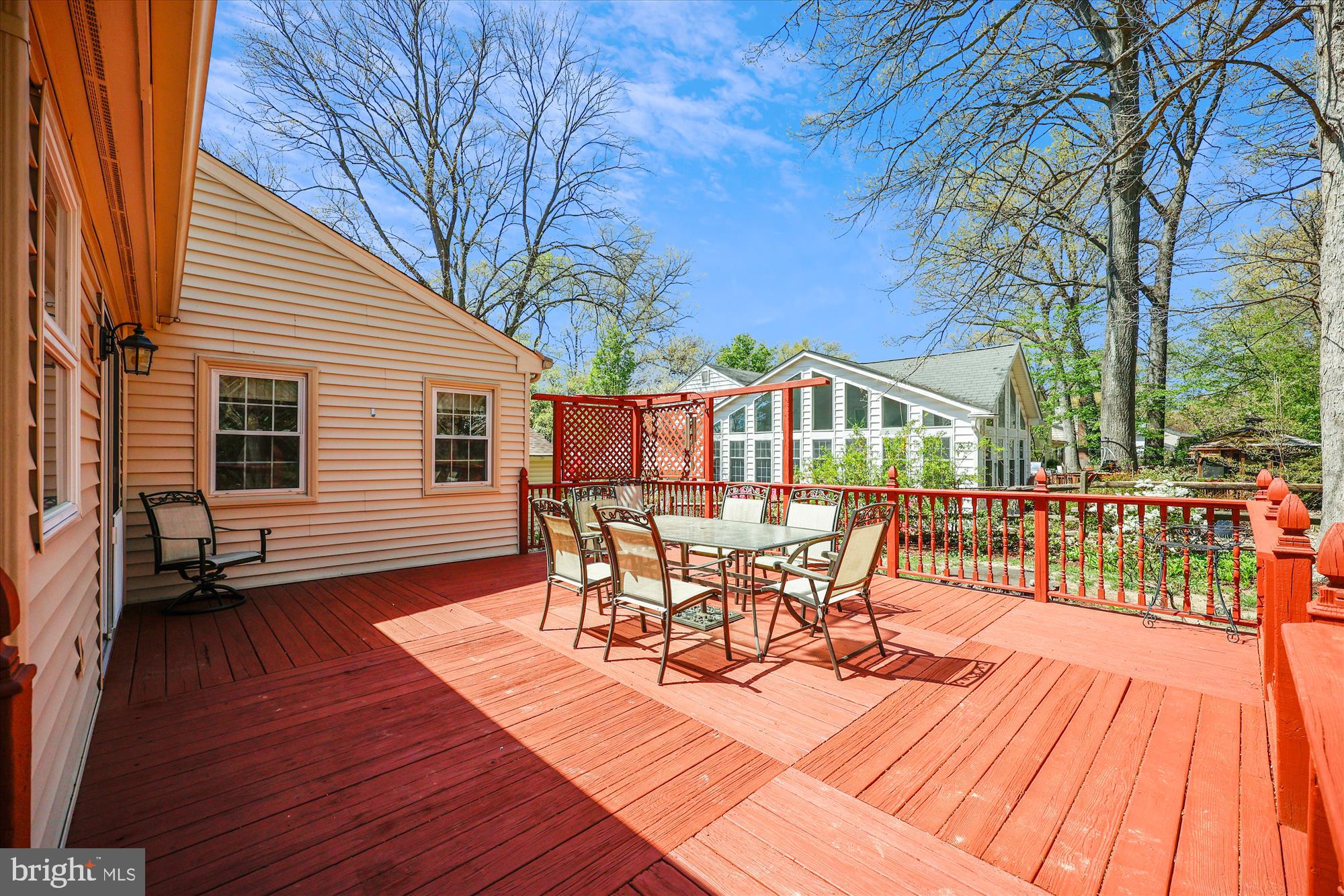 315 Summit Hall Road Gaithersburg, MD 20877 - Photo 67 of 76 a view of a patio with table and chairs and wooden floor