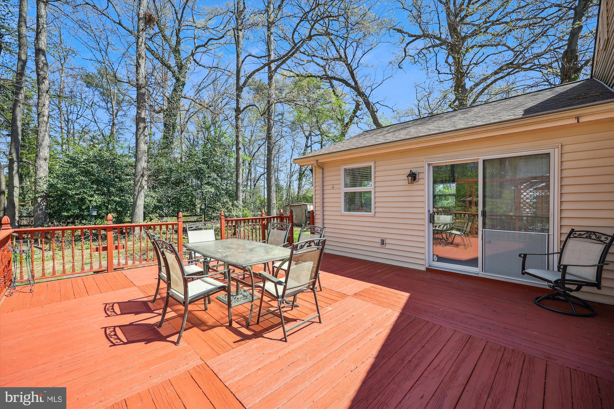 315 Summit Hall Road Gaithersburg, MD 20877 - Photo 68 of 76 a view of a patio with a table chairs and wooden floor