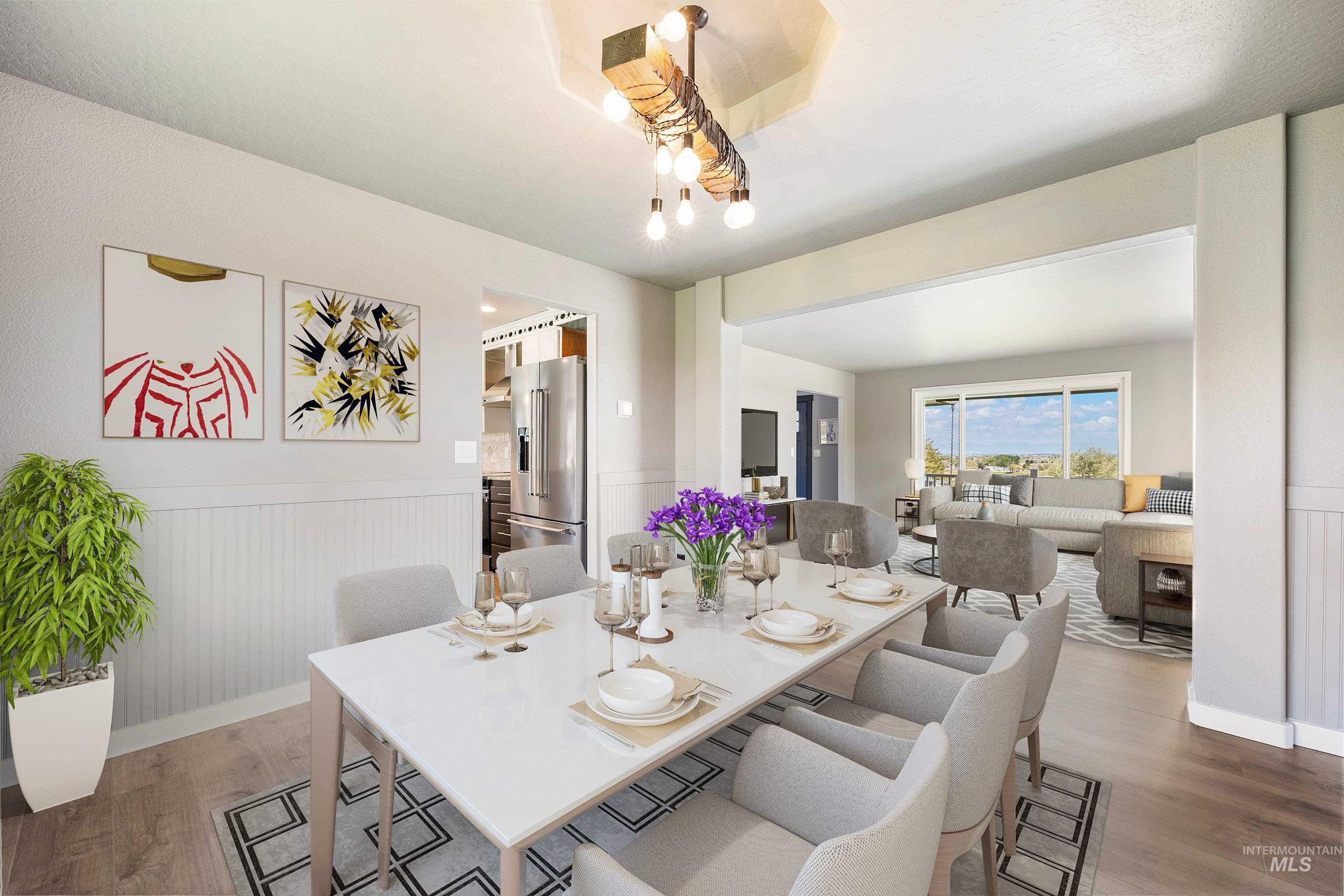7657 Track Road Nampa, ID 83686 - Photo 13 of 50 Dining area with a coffered ceiling and a rustic-inspired chandelier