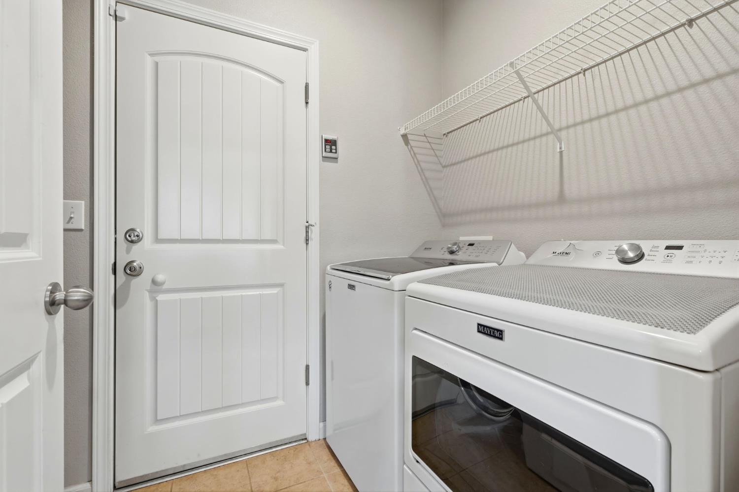 1206 North Kaplan Place Hanford, CA 93230 - Photo 27 of 52 a utility room with dryer and washer