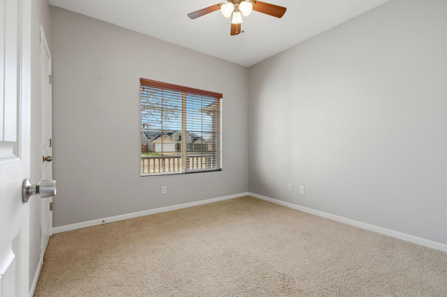 1206 North Kaplan Place Hanford, CA 93230 - Photo 31 of 52 an empty room with a window