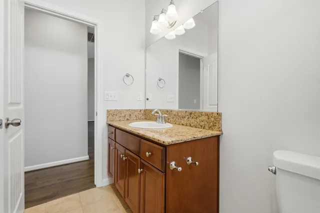 a view of a big room with windows and cabinet
