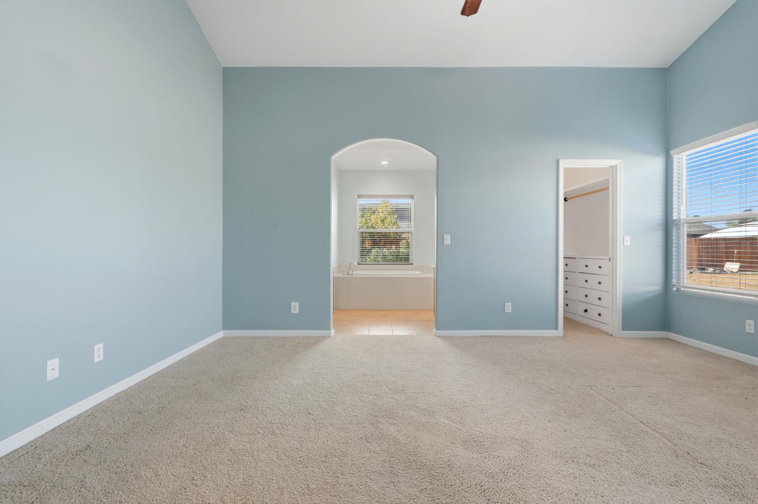 1206 North Kaplan Place Hanford, CA 93230 - Photo 37 of 52 a view of a big room with windows and cabinet