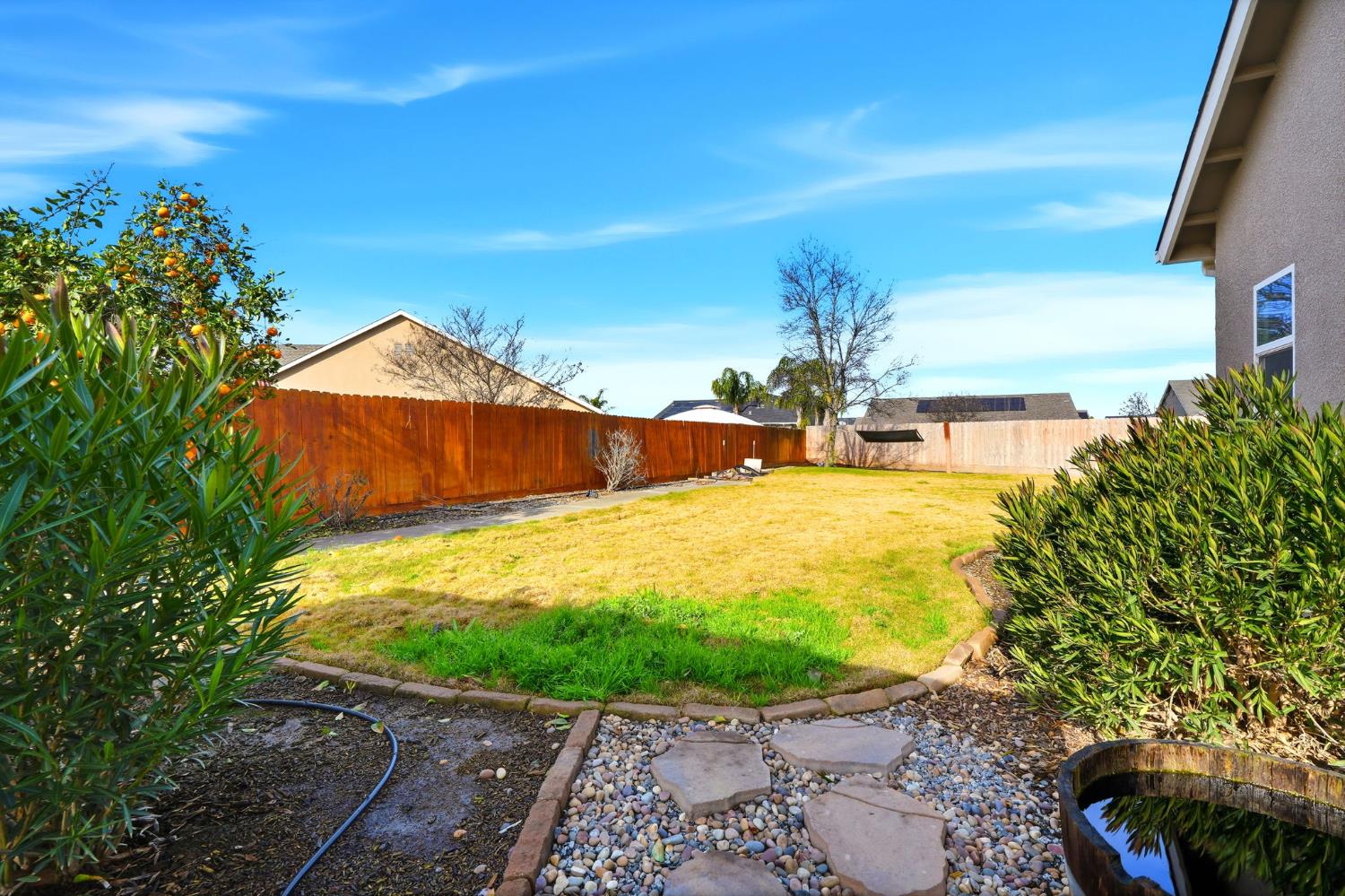 1206 North Kaplan Place Hanford, CA 93230 - Photo 47 of 52 a view of an outdoor space with a house