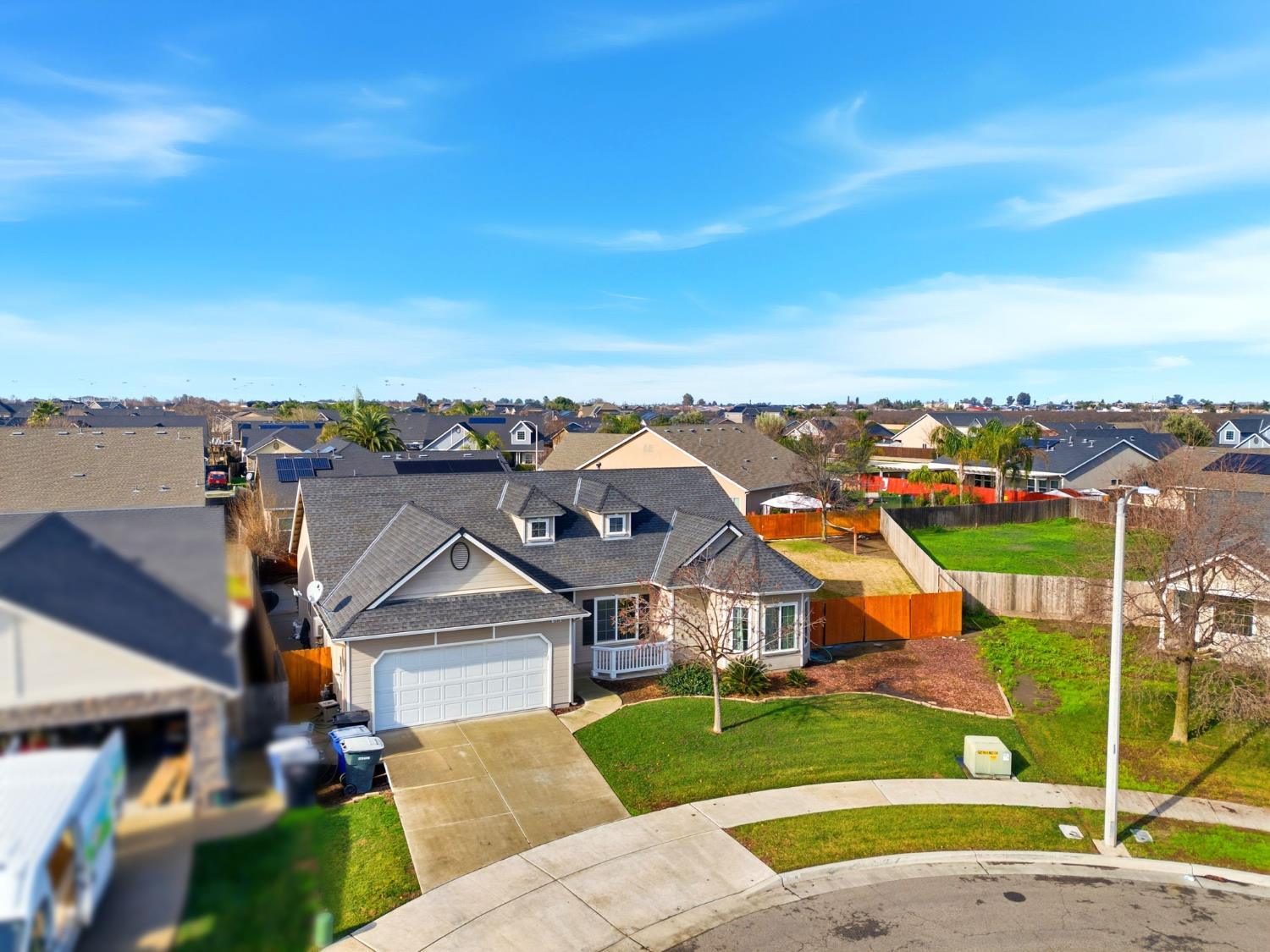 1206 North Kaplan Place Hanford, CA 93230 - Photo 6 of 52 an aerial view of a house with a yard