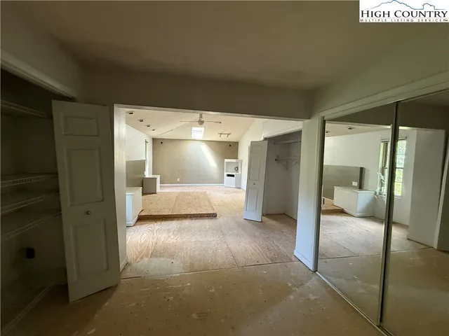 a bathroom with a glass door shower
