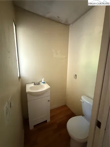 a bathroom with a sink and toilet