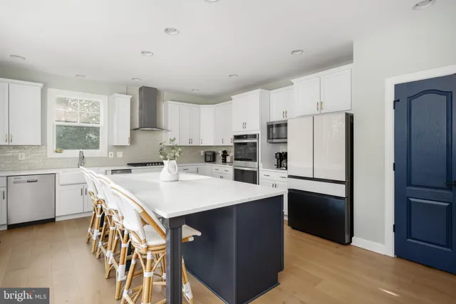 a bed room with a bed window and a television