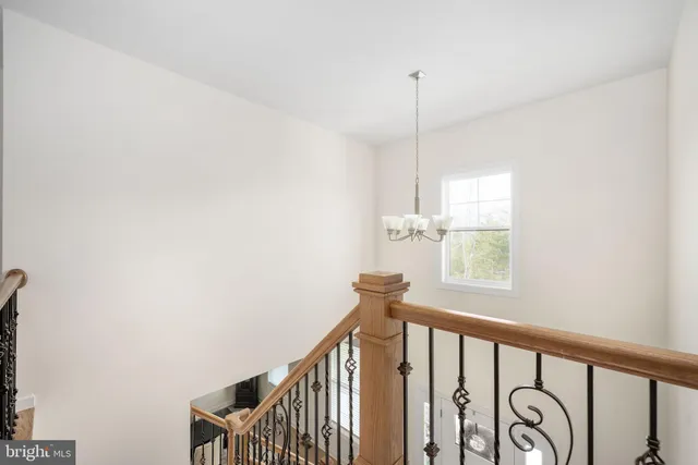 a bathroom with a sink a vanity and toilet