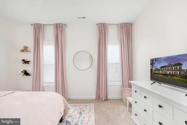 a view of a swimming pool with an outdoor seating