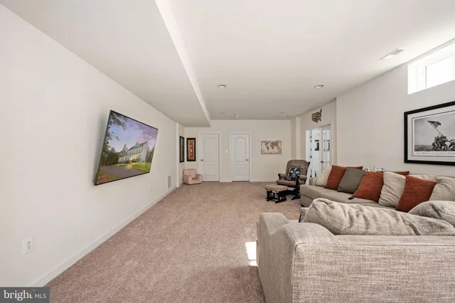 a view of swimming pool with outdoor seating and a yard