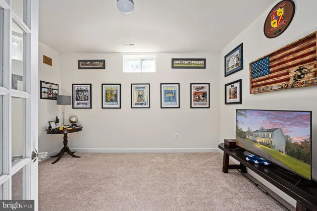 a view of swimming pool with a yard in the background