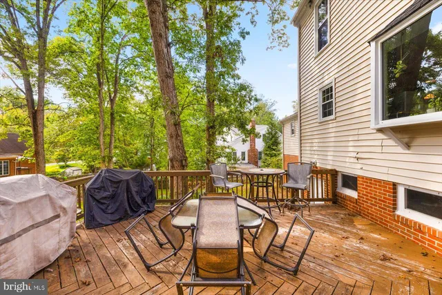 a view of a patio with couple of chairs