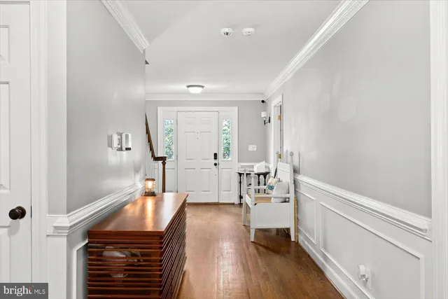 a very nice looking room with wooden floor