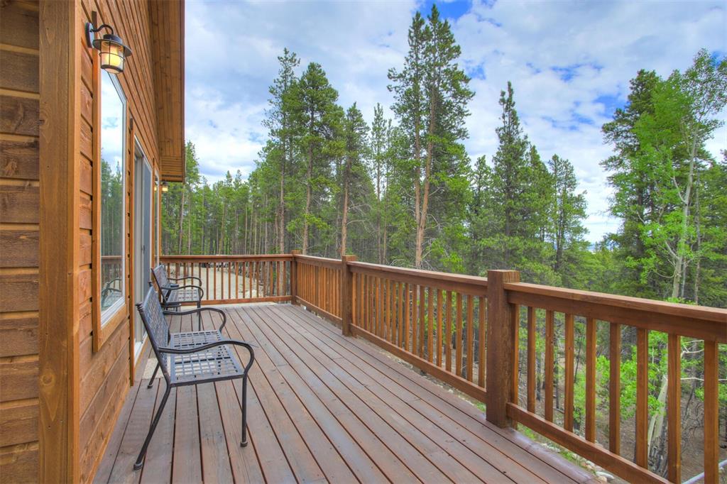 1002 Venture Road Fairplay, CO 80440 - Photo 25 of 35 a view of balcony with wooden floor and fence