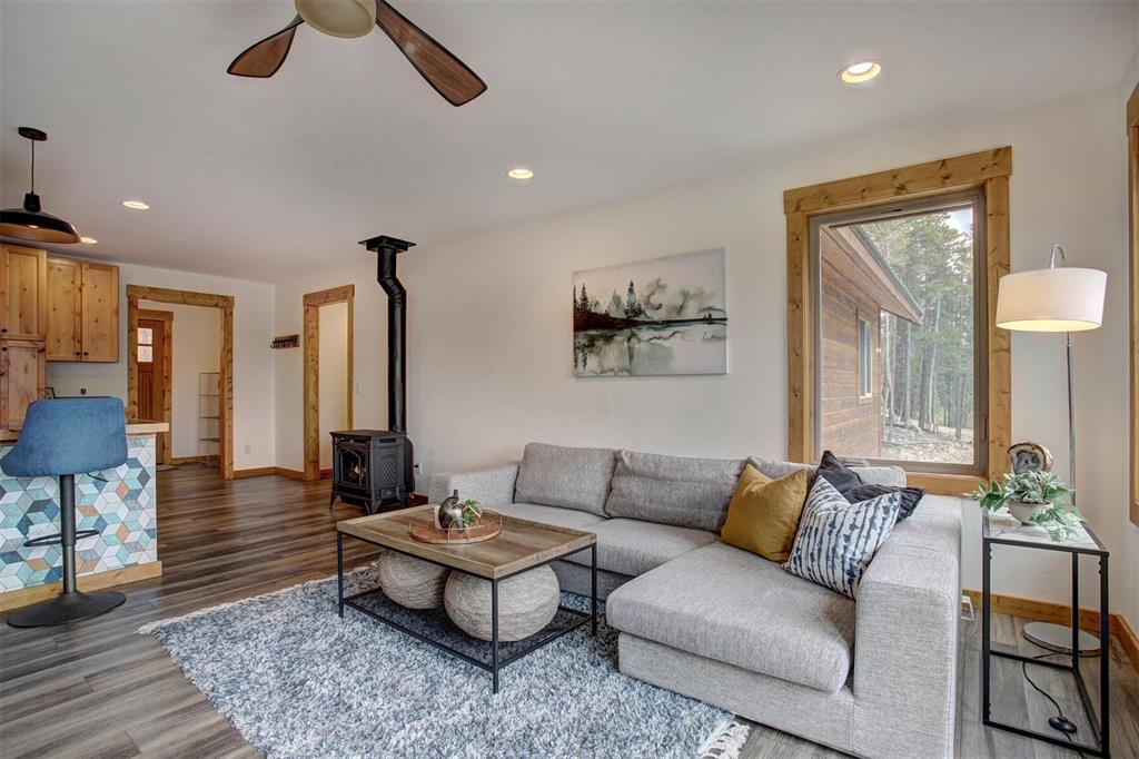 1002 Venture Road Fairplay, CO 80440 - Photo 8 of 35 a living room with furniture and a table