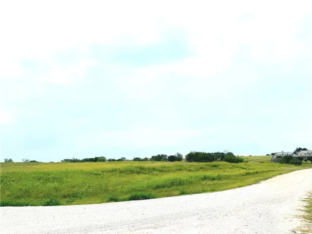 a view of grassy field with grassy area