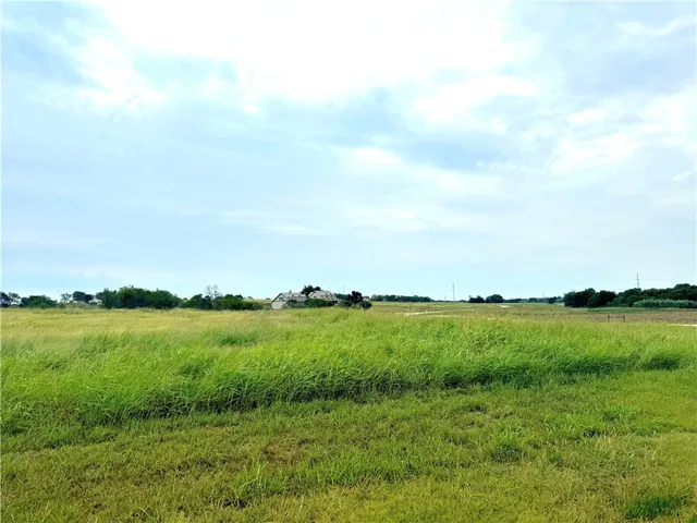 a view of an ocean and city