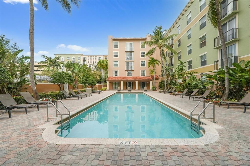 1919 Van Buren Street, Unit 609 Hollywood, FL 33020 - Photo 9 of 15 a view of a swimming pool with a patio