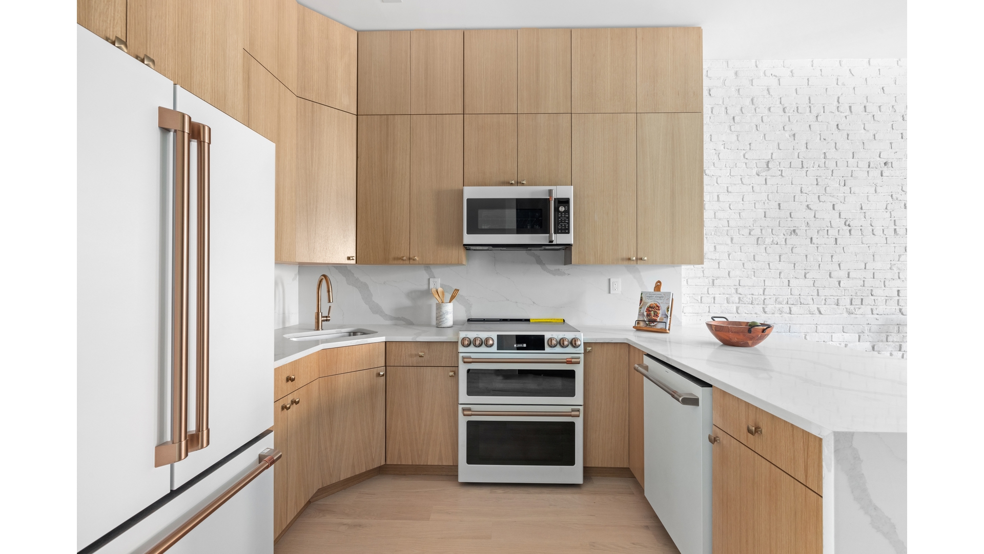112 Luquer Street, Unit 2 Brooklyn, NY 11231 - Photo 1 of 11 a kitchen with stainless steel appliances a stove microwave and sink
