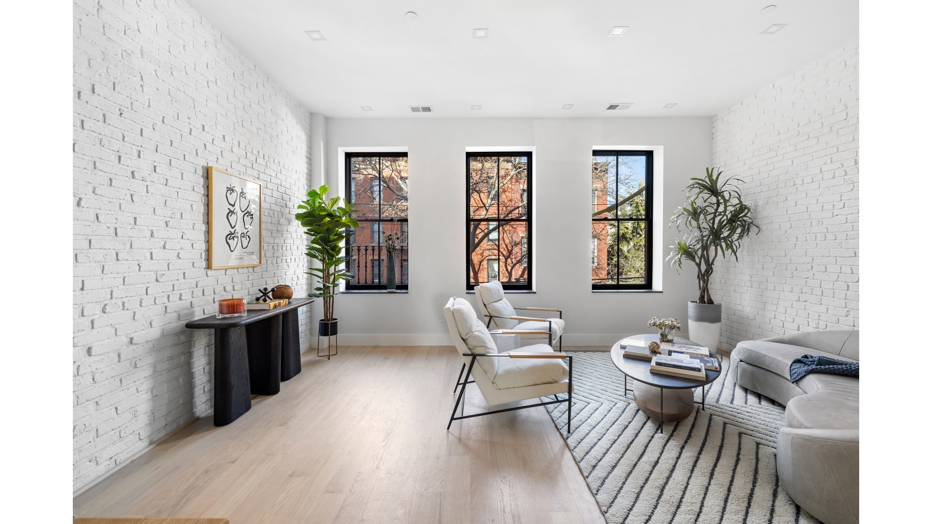 112 Luquer Street, Unit 2 Brooklyn, NY 11231 - Photo 4 of 11 a living room with furniture and wooden floor