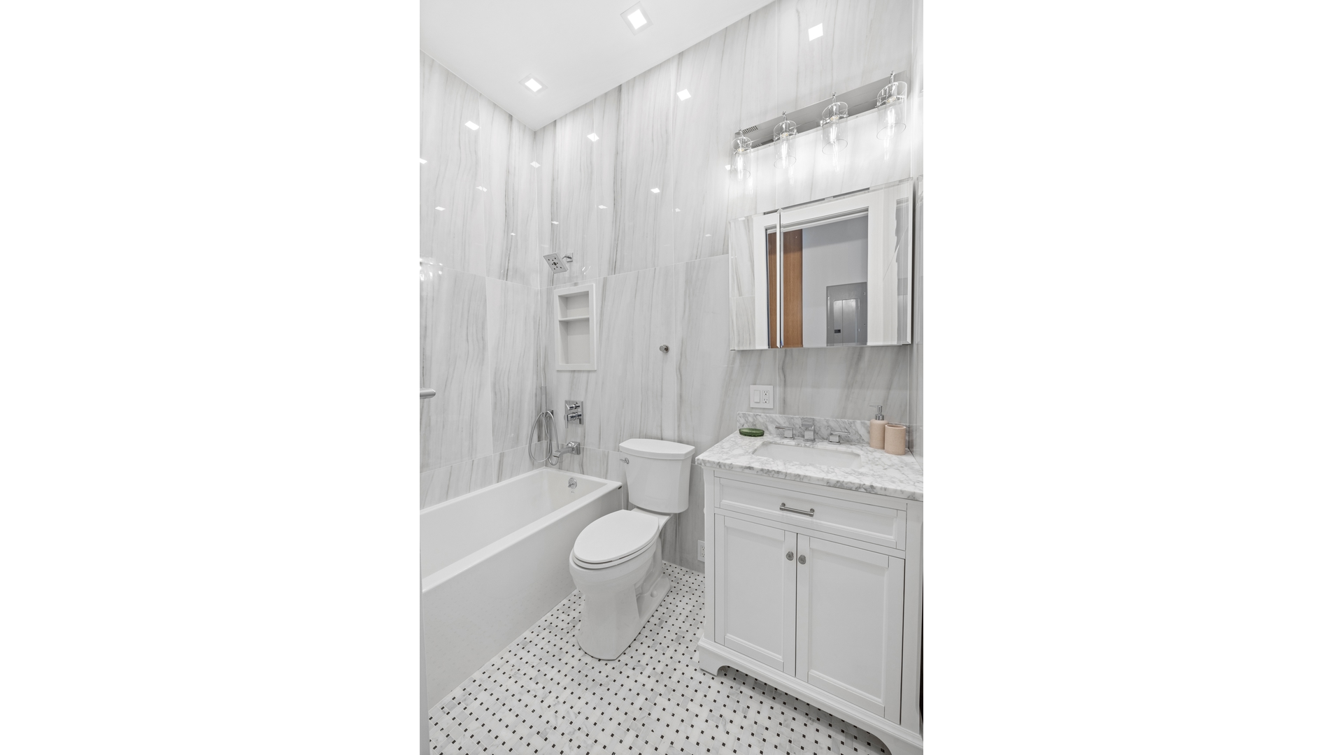 112 Luquer Street, Unit 2 Brooklyn, NY 11231 - Photo 6 of 11 a bathroom with a sink a toilet and shower