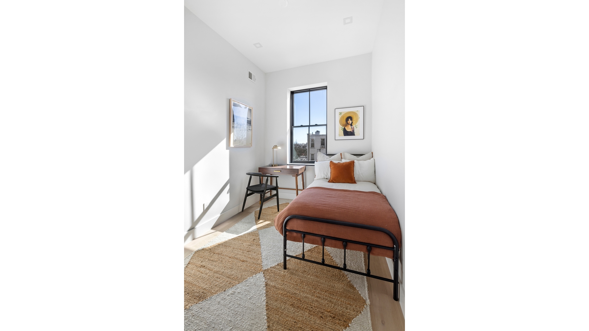 112 Luquer Street, Unit 2 Brooklyn, NY 11231 - Photo 7 of 11 a living room with furniture and a chair