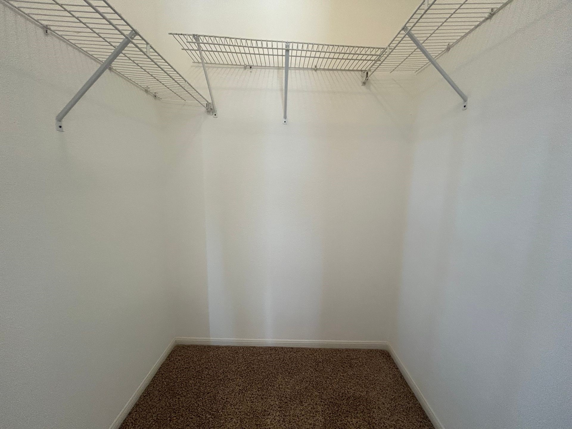 12550 Whittington Drive, Unit 610 Houston, TX 77077 - Photo 10 of 10 a view of a room with racks on the wall