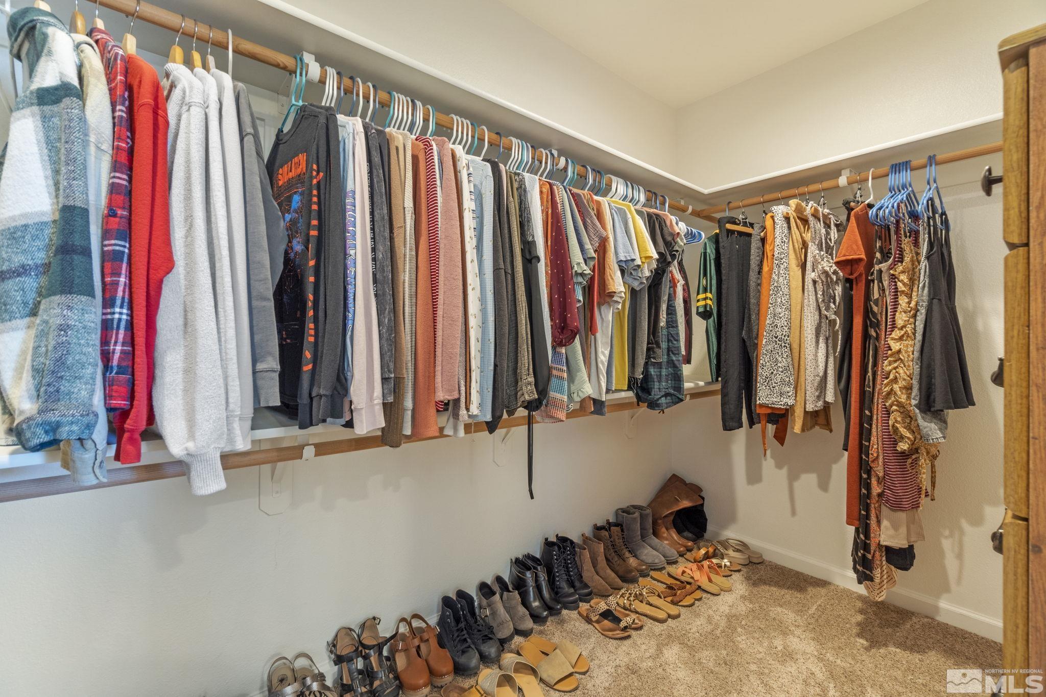 1837 Sky Ridge Drive Fallon, NV 89406 - Photo 21 of 34 a view of walk in closet with clothes